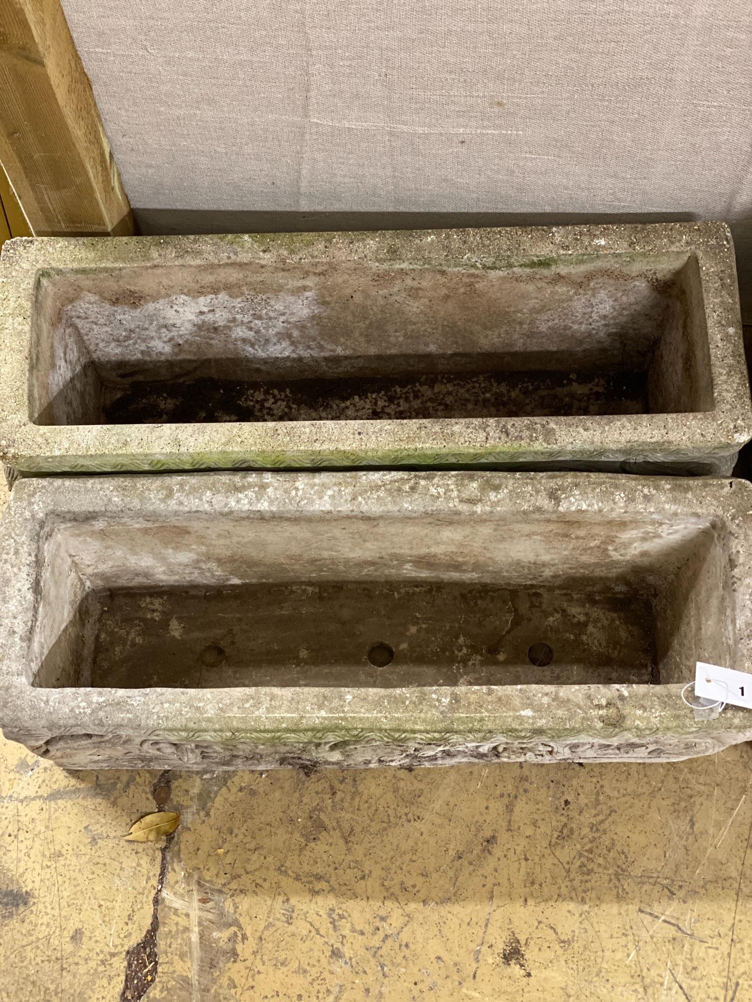 A pair of reconstituted stone garden troughs, width 74cm